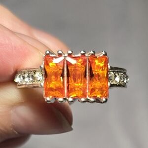 Elegant Silver Ring with Orange Gemstones